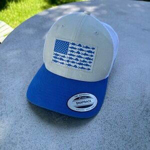 Blue and white PFG snapback hat